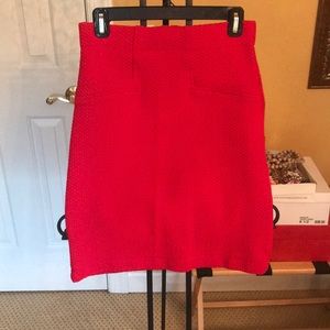 Red Anthropologie skirt